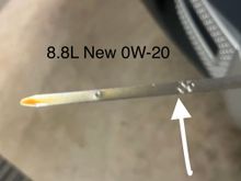 This is right after a fill with 8.8 L of new oil. 

A very light straw color and a correct fill volume. 