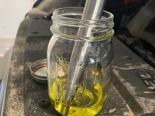 Remove fluid to prevent overflow 