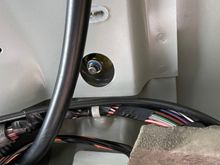 This is the driver side looking up to the roof bar bolt. 