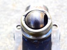 The metal ring around the bearing is fragile and bends very easily. Using 2 flat heads to pry out the bearing is a no go, unless you suggest the metal ring is unimportant. Still working out a solution with the tools I have... dont have any bolts small enough to screw into the small hole either.