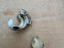 Broken window rollers from dealer repair over 10 years ago in bottom of door