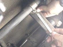 Step 11b Disconnect Breather Hose Clamp and Bracket