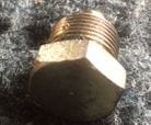 22mm brass plug, removed, prior to taping.