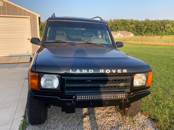 OEM inner steel bumper modified, light bar mount welded on. Not heavy duty at all, but functional. 