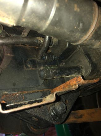 Charcoal canister 
Top tube is vent to purge valve into intake 
Middle tube is tank vent like into canister 
Bottom tube goes to vapour leak detection pump and into filter in engine passenger side 
