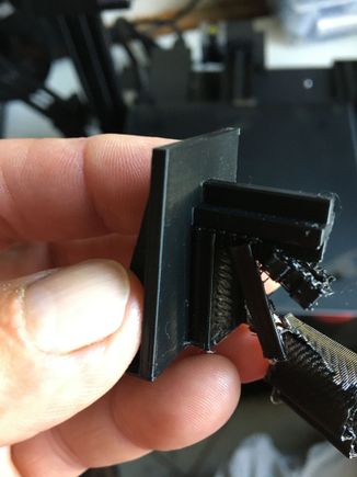 They are called supports, do the floating part can stay up. If not you can build it in two pieces, but then you have to glue them together. 