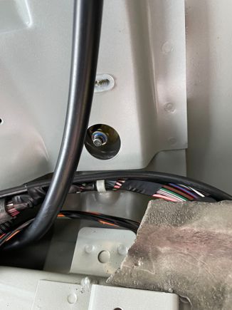 This is the driver side looking up to the roof bar bolt. 