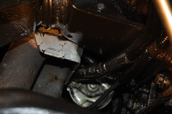 This is the motor mount oil.  It is also all over the starter, wires and starter heat shield.
