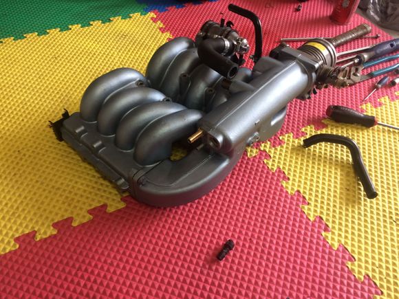 New brass barb... added epoxy bead to joint of butted brass barb to intake manifold.