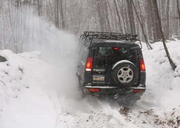 Trying to get unstuck...rear diff was hung up, RF tire was off the ground, LR tire was stuck in the wheel well, and I wasn't going anywhere...