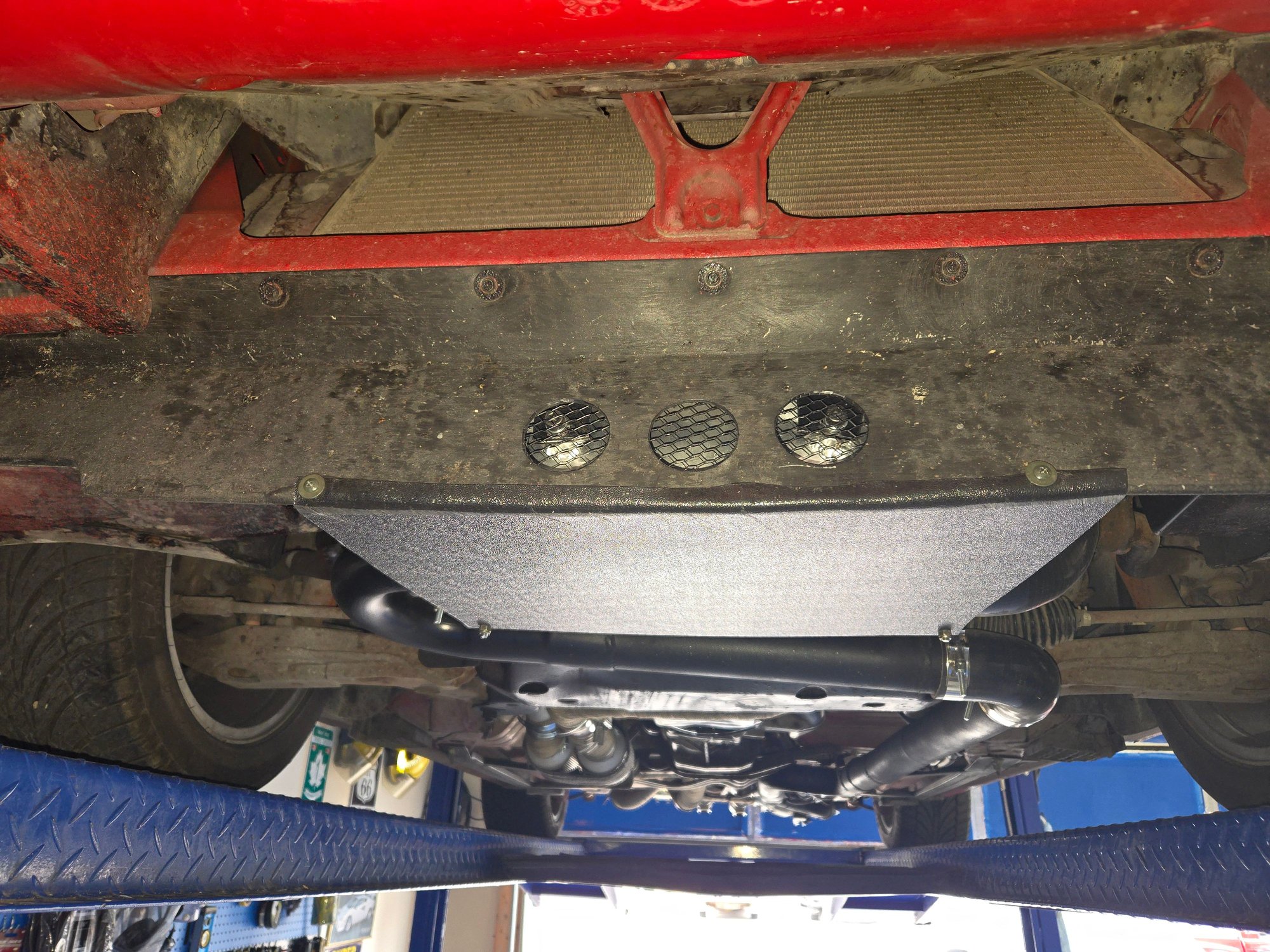 The intercooler closed in the plastic plate i made.   A few holes drilled in the splash gaurd with mesh epoxied in to keep rocks and debris out.  This works very good at cooling the intake charge