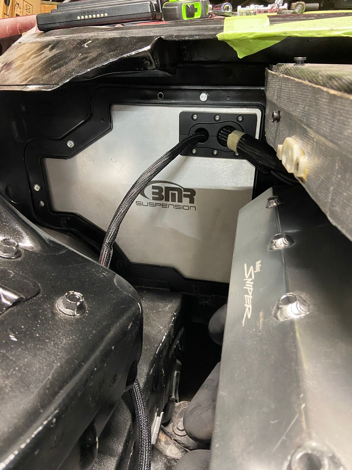 Roughly bolted in A/C delete panel. Found some pass through adapter for Holley EFI harness. Cut and mounted into the delete panel as the firewall didn�t have a flat enough surface for mounting. 