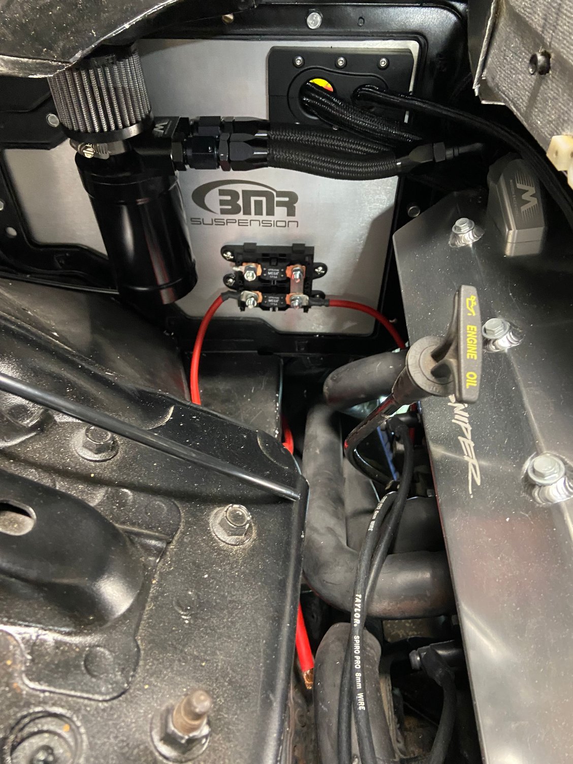 Loosely ran battery to starter wiring with junction block on A/C delete panel. This will has been cleaned up and completed. Also started wiring kit first m American autowire for the rest of the vehicle. 