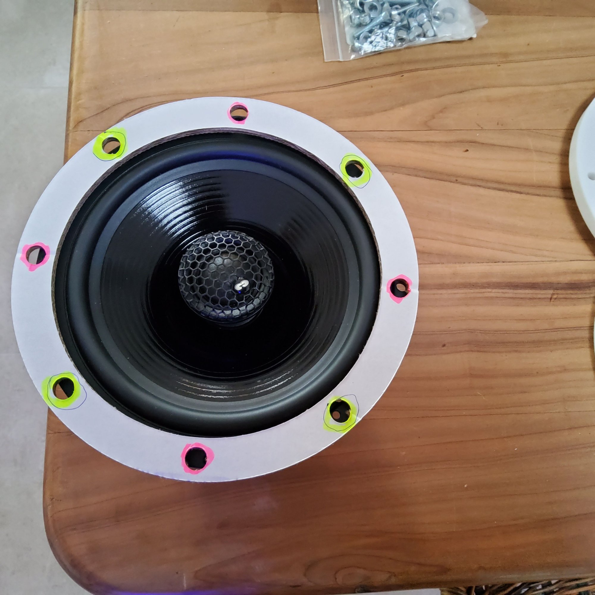 The template must bolt to the car first, then the speaker bolt to the template