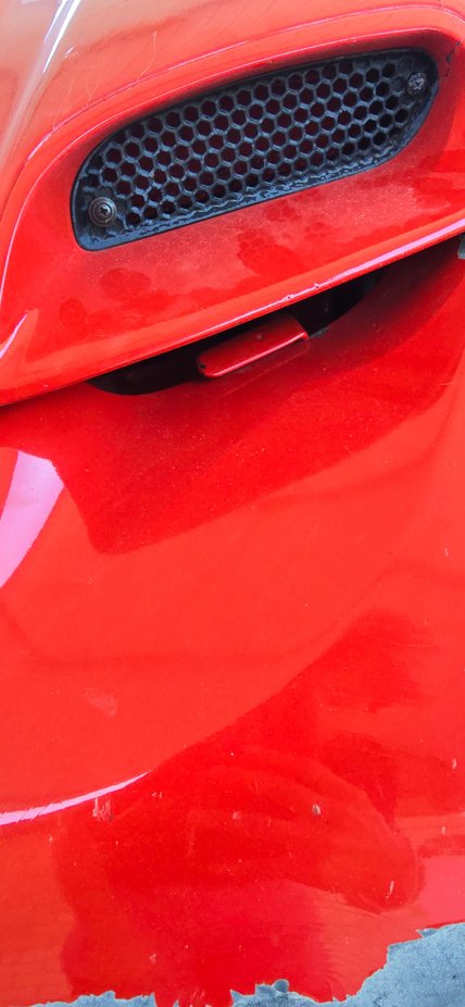 hey i was wondering if anybody knew why my hood latch hits my bumper on my 98 trans am. i checked the screws and i couldnt find a solution. 