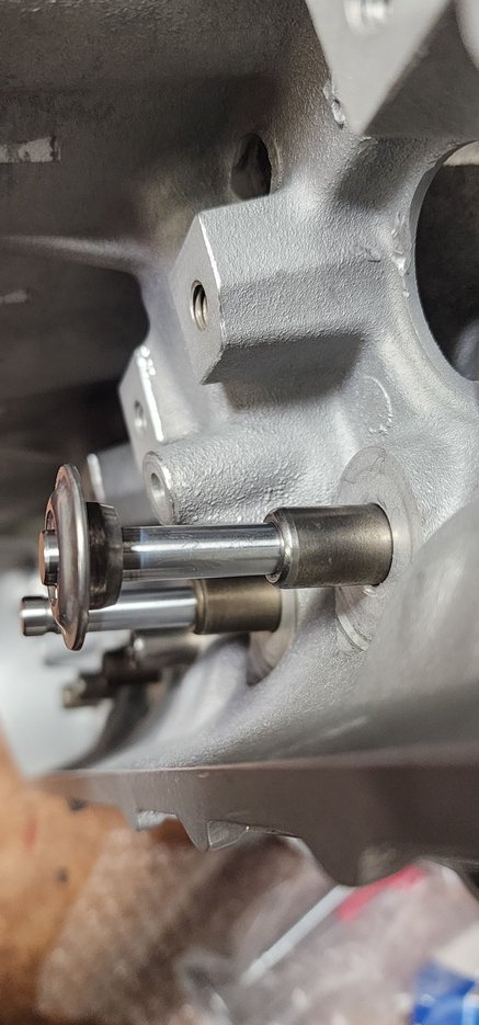 Retainer to spring pocket