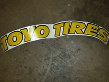 Fancy new 2 tone Toyo stickers that curve for a fender arch. 