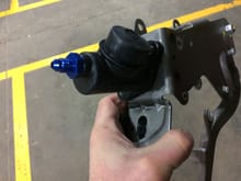 Tick mounted to bracket assembly