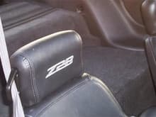 I bought t/a seats, and had the headrests embroidered.