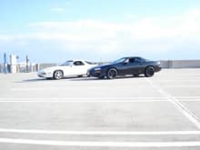 My 98 Z28 and my buddies Porsche. Your car may have cost more new but i still blow its doors off :)