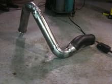 The &quot;Exhaust&quot;....

5&quot; downpipe, necks to 4&quot; then stays at 4&quot; all the way out the fender