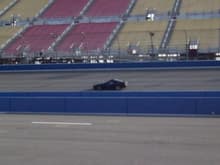 Crossing the start/finish line on the Nascar track at California Speedway. 115mph