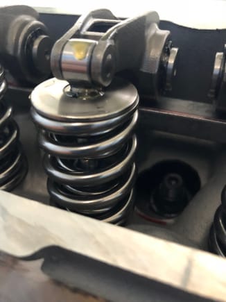 Micro-polished springs, Ti retainers etc.
Ferea 1.6 Nitrided exhaust valves.
Hollow SS intake valves.
TSP roller rockers.
TSP proper pushrods
Johnson Drop-in Lifters
ARP head studs/nuts
Uhhhhh...mmmm
PRC Headwork to something like 350+clutch at .650 blah
Should be enough to make 700hp if my cam/rpm/displacement/tune/etc are all happy.
