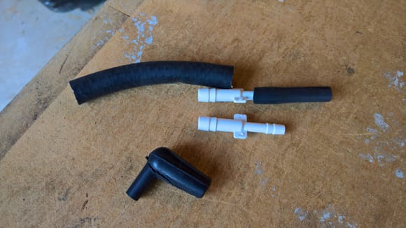 I replaced it with an adapter fitting and some proper automotive hoses which should withstand plenty of abuse.