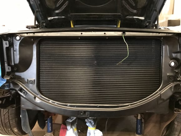 Radiator fits like a glove! Just had to do some trimming on the rubber isolators.  No mods to the support had to be done.