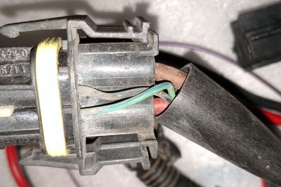 Top of MB connector showing two small wires.