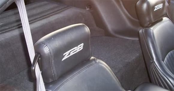 I bought t/a seats, and had the headrests embroidered.