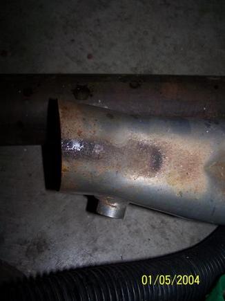 the collector was cut off slightly on one... shouldn't be an issue.. plenty of room to weld/clamp exhaust on.