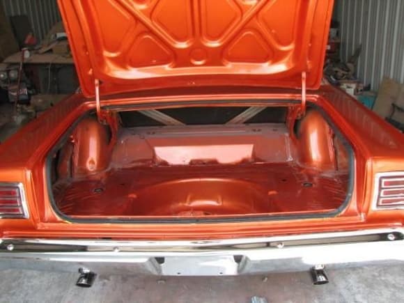 Trunk is finished as nice as exterior in Malibu Sunset Orange Metallic paint