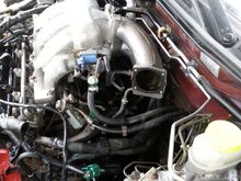 Took the TB off to clean properly. Check the coolant lines connected to it. Nasty oil burner. Look at the oil backed up in the intake.