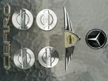 CEFIRO  Badges Brand New. Wheel Centre Caps Used.