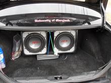 I will build the subs and amp into the trunk, like I see in the shows and movies.