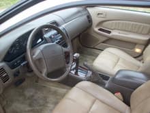 Leather seats, woodgrain on the dash and even climate control instead of knobs to control the heat/air.