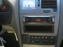 Garmin in the vent cluster, iTouch dock in the face of the coin tray