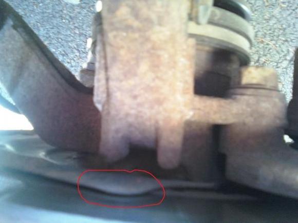 This is what the backing plate looked like before I bent it back it was sitting right on the rotor.