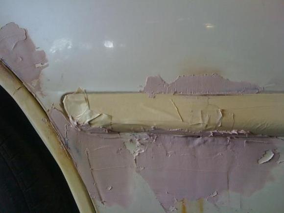 002 tapeing off and bondo lol not done dont worry just out it on need to sand and put more on and sand and primer and paint