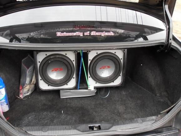 I will build the subs and amp into the trunk, like I see in the shows and movies.