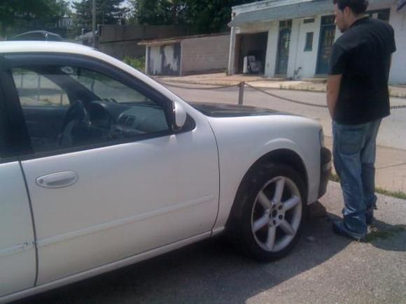 My son Lucan saying good bye to his beloved 97 Maxima Se loaded with black leather interior,bose system,heated side view mirror's full options !!! 18" 350 z wheel's stillen rear swaybar.Some drunk bitch wrecked the car while it was parked.We loved this car it was our families 4th maxima RIP