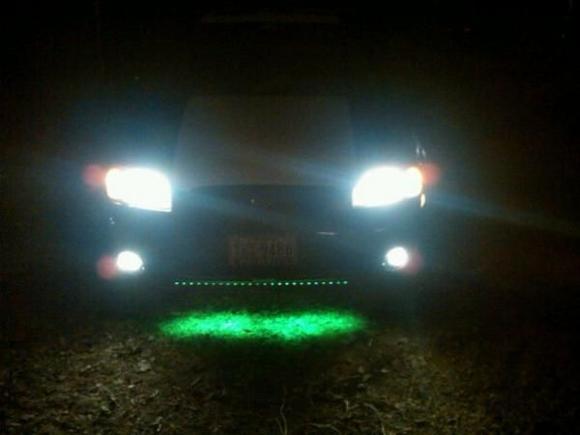 Night time with fresh paint and a green under body kit.