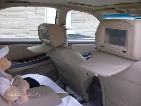 7" touchscreens tvs with dvd players in headrest with headphones