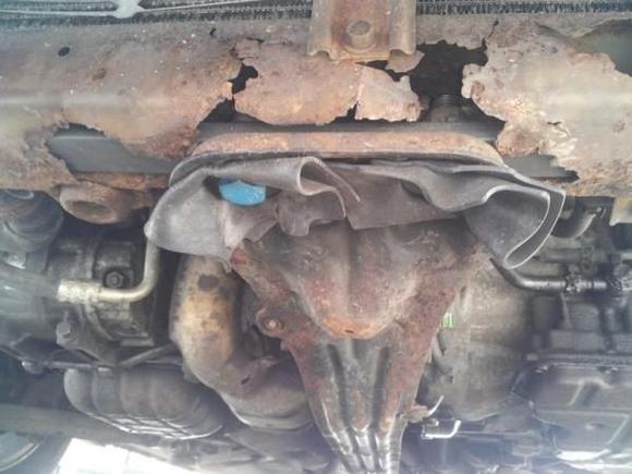 Props to the boyfriend - end result of homemade repair for rusted out Radiator Core Support - SOLID.