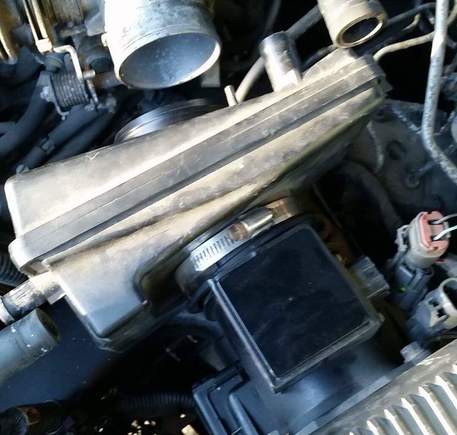 It goes under the hose clamp.