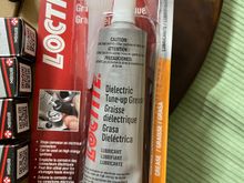 Loctite Dielectric grease from ECS Tuning.