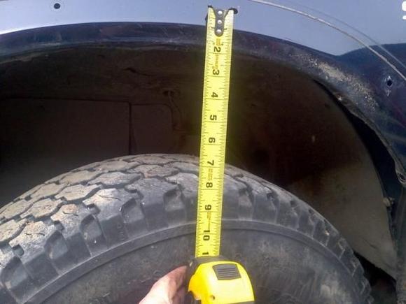 how much I cut fenders for future tire plans....35's and 2" spacers...OME 2" lift on way...if need be I will lift body another 2 inches