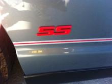 Red pin stripping underneath the red SS emblem