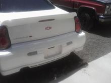 I love the red emblems on the white car.